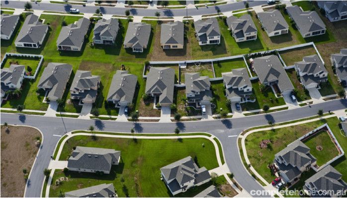 An aerial view of a residential area with lots of houses