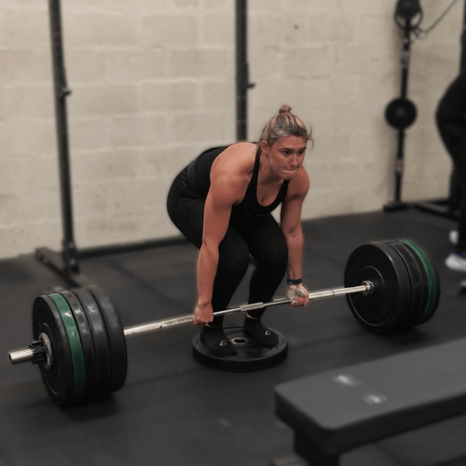 Woman hitting a deadlift PB at Learn to Lift Bootcamp in Glasgow