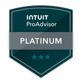 A dark teal shield-shaped logo featuring the white text 