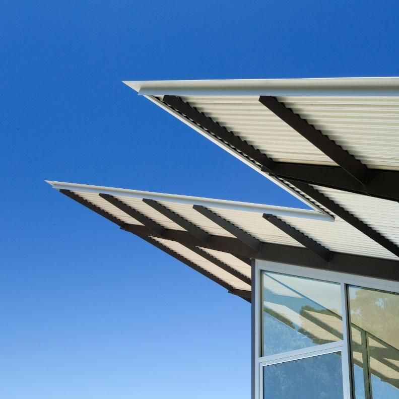 A Commercial Roof With Exposed Rafters — Glenn Merrick Constructions In Bowen, QLD