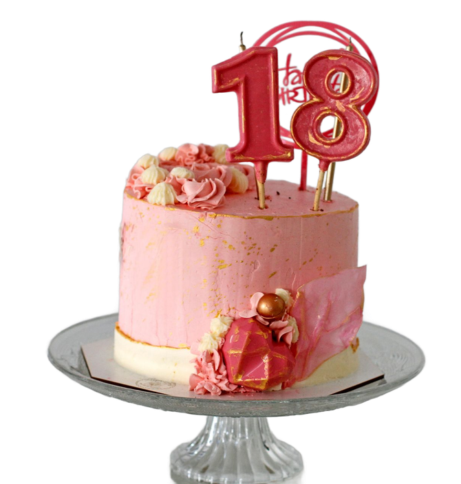Torta di compleanno rosa con candela