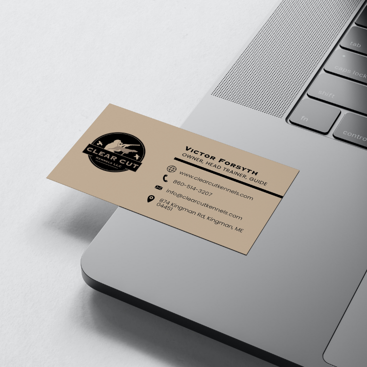 clear cut kennels business card laying down