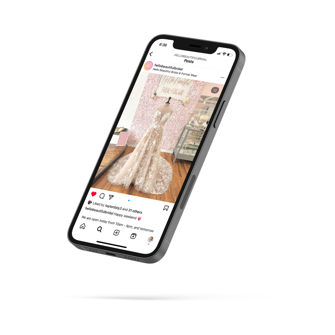 A cell phone with a picture of a wedding dress on the screen.