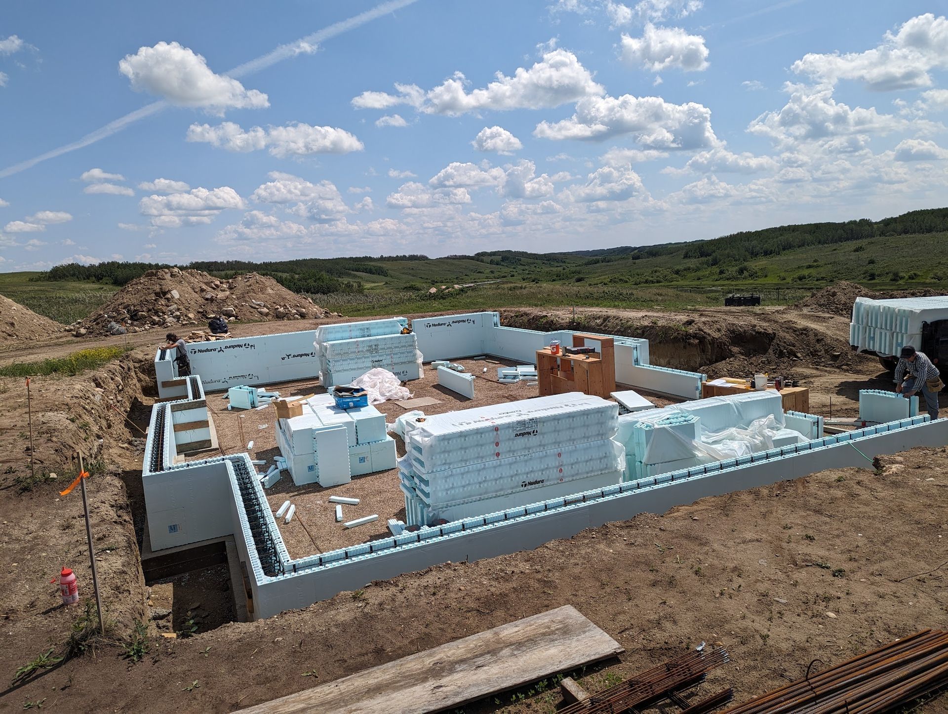 A construction site with a lot of styrofoam blocks
