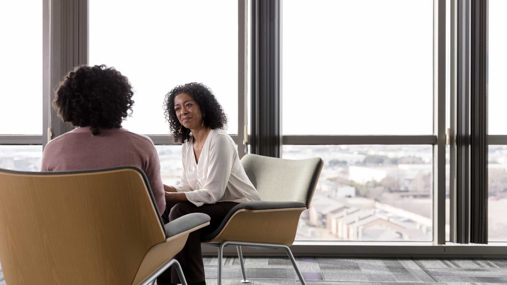 Black person talking with therapist about their mental health
