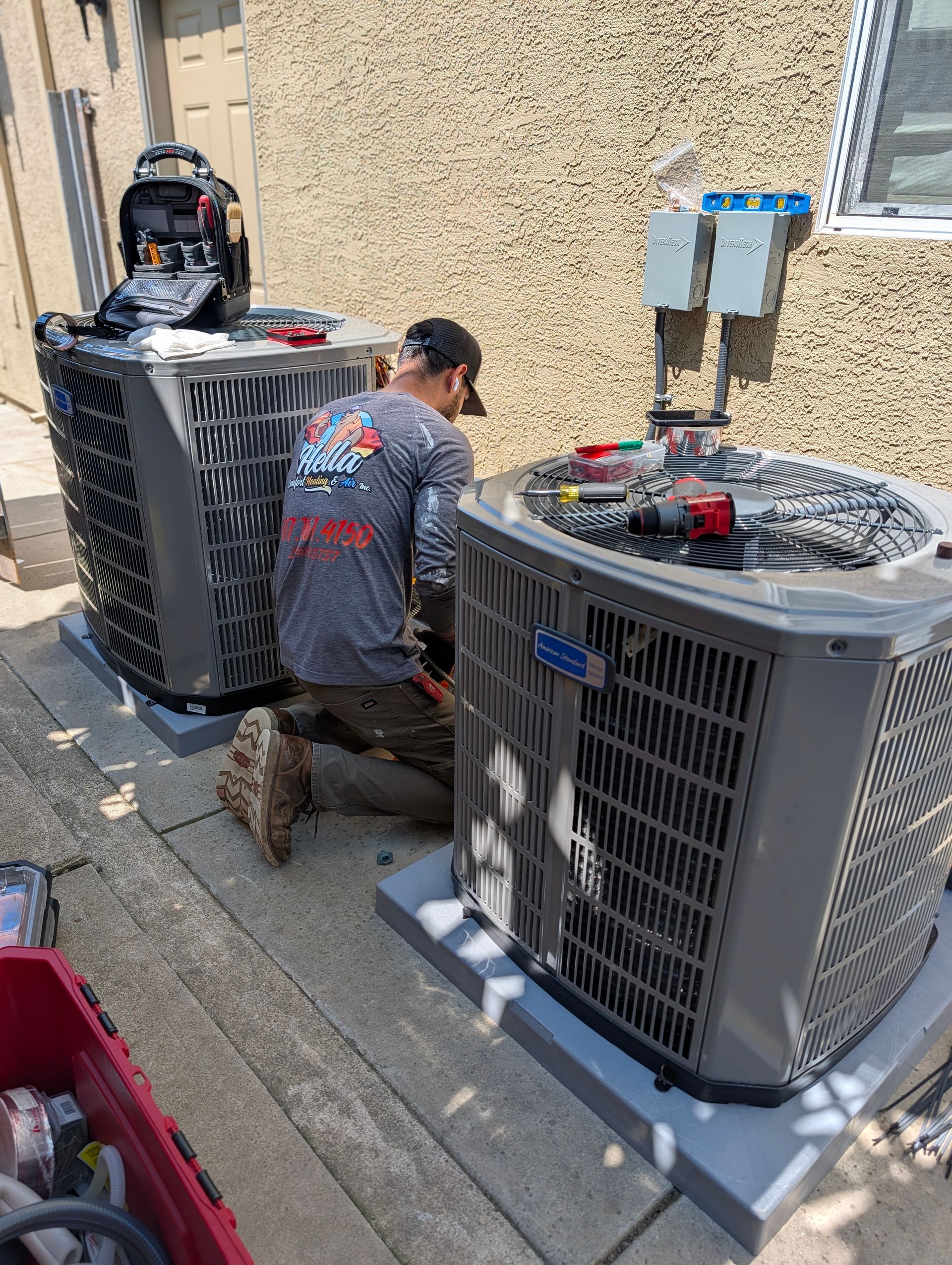 Technician checking refrigerant lines in Napa Valley home