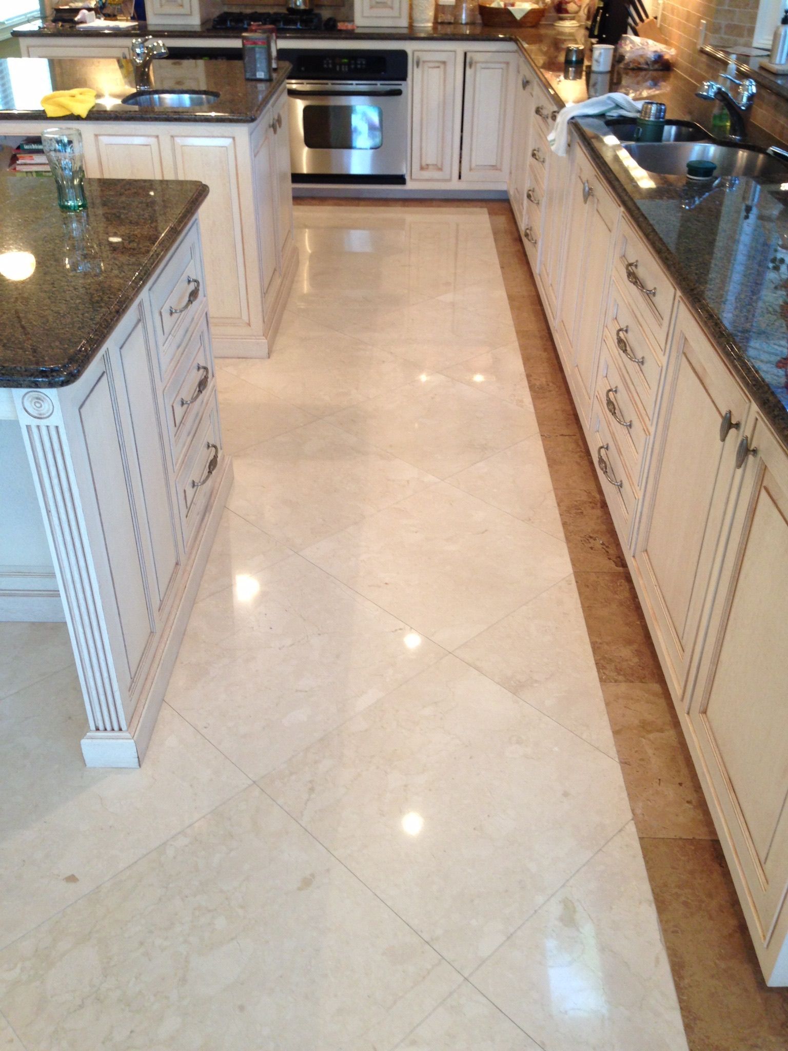 Kitchen With Beige Tile Flooring, White , and Countertops — Stone Restore by Hoover and Lane in Lowcountry, South Carolina