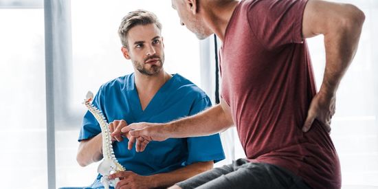 Back Pain Consultation — Xenia, OH — Xenia Chiropractic Back Pain Consultation — Xenia, OH — Xenia Chiropractic