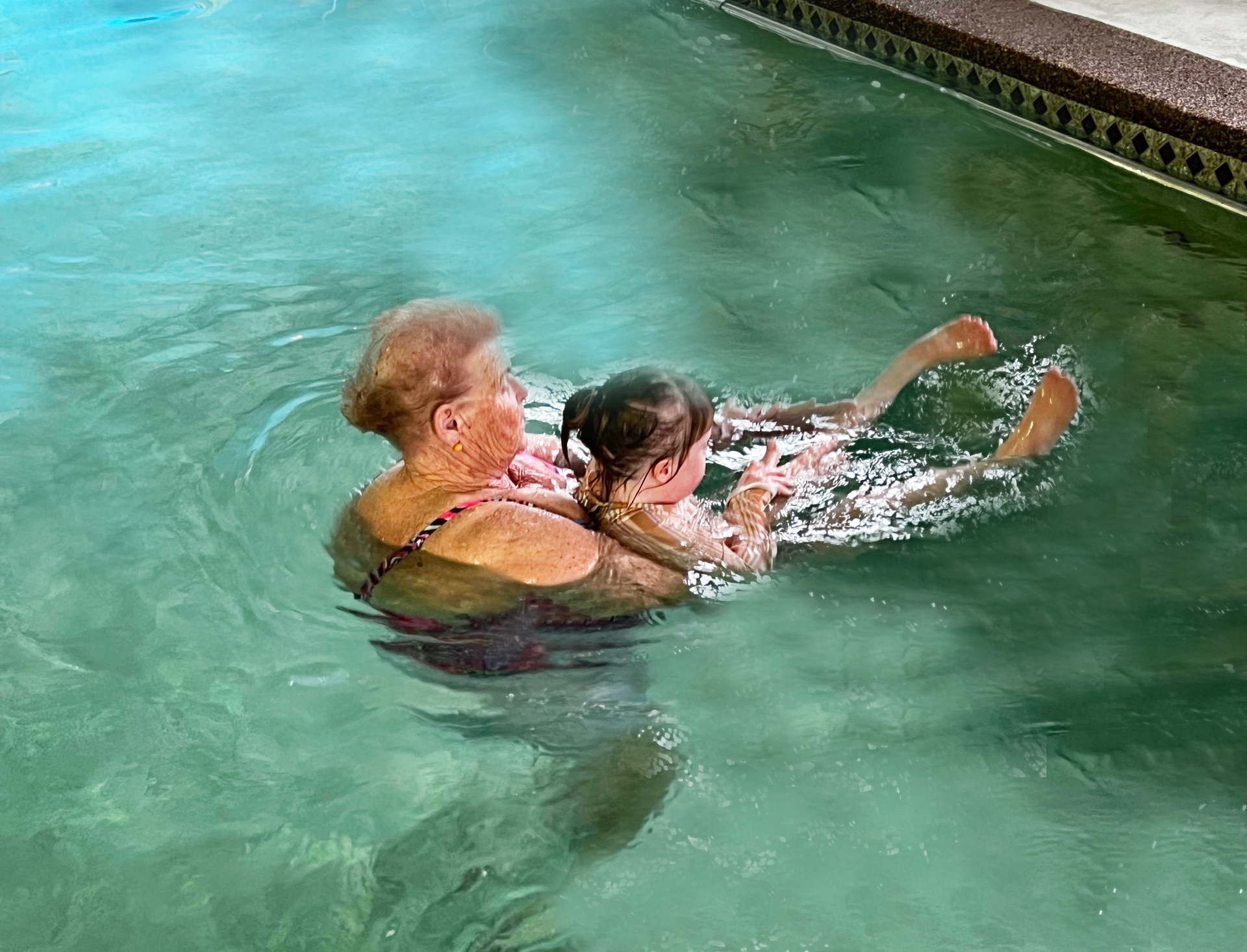 Child With Special Needs Receiving Swimming Lessons - Hydrotherapy in Croudance Bay, NSW Child With Special Needs Receiving Swimming Lessons - Hydrotherapy in Croudance Bay, NSW