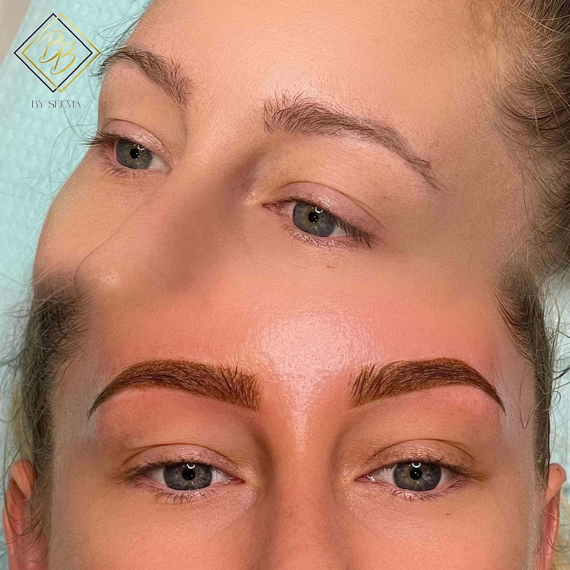Close-up of a face showing shaped eyebrows and natural makeup, with a bright teal background
