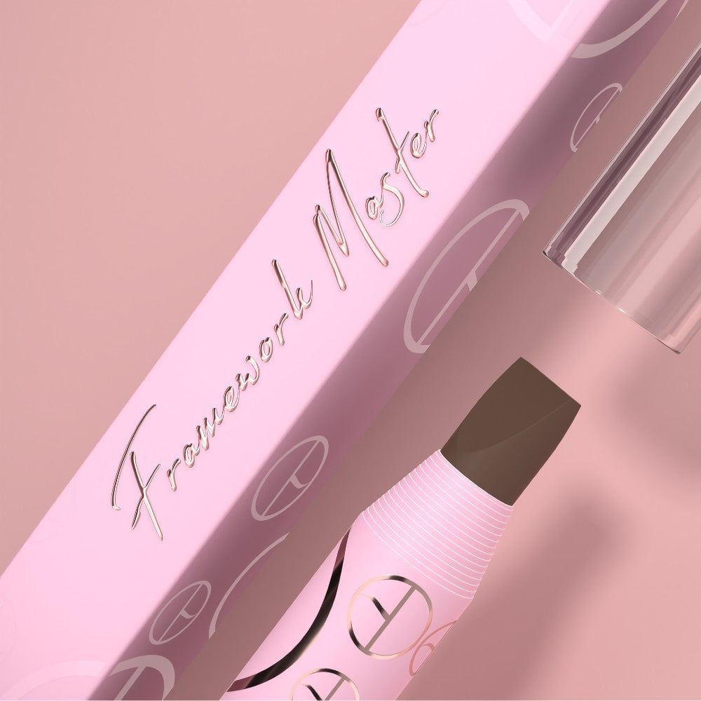 Pink mascara packaging with cursive branding and a black mascara wand on a soft pink background
