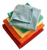 A stack of folded microfiber cleaning cloths in assorted colors, including red, orange, yellow, green, and light blue.