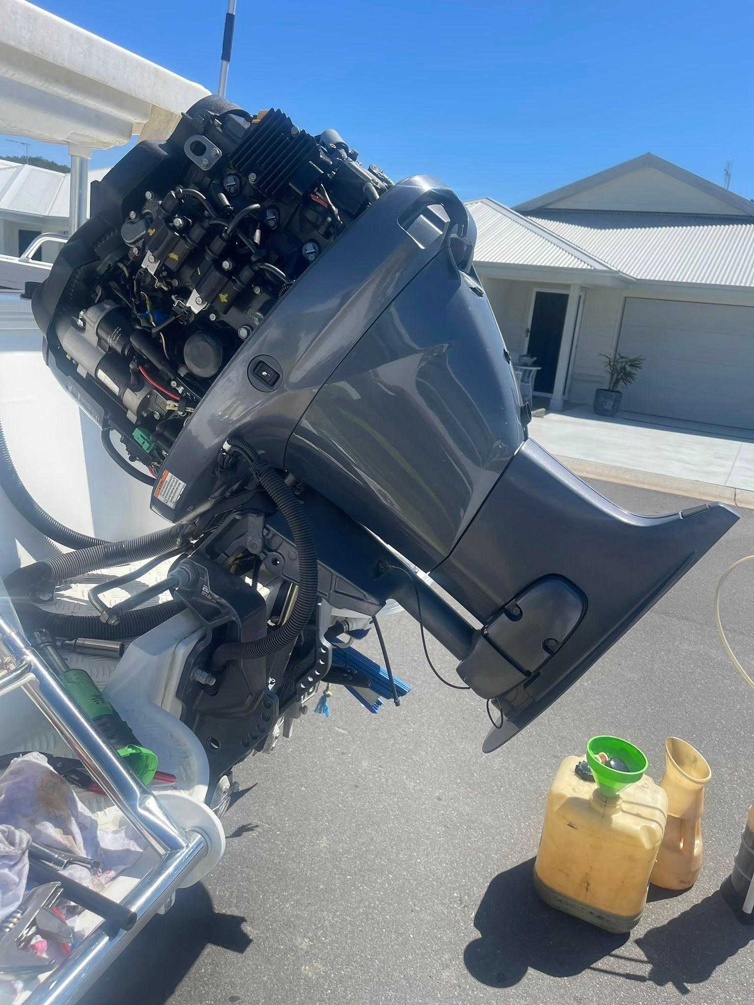 A Large, Gray Outboard Boat Motor Mounted on a Boat — Hastings Mobile Marine Services In Wauchope, NSW