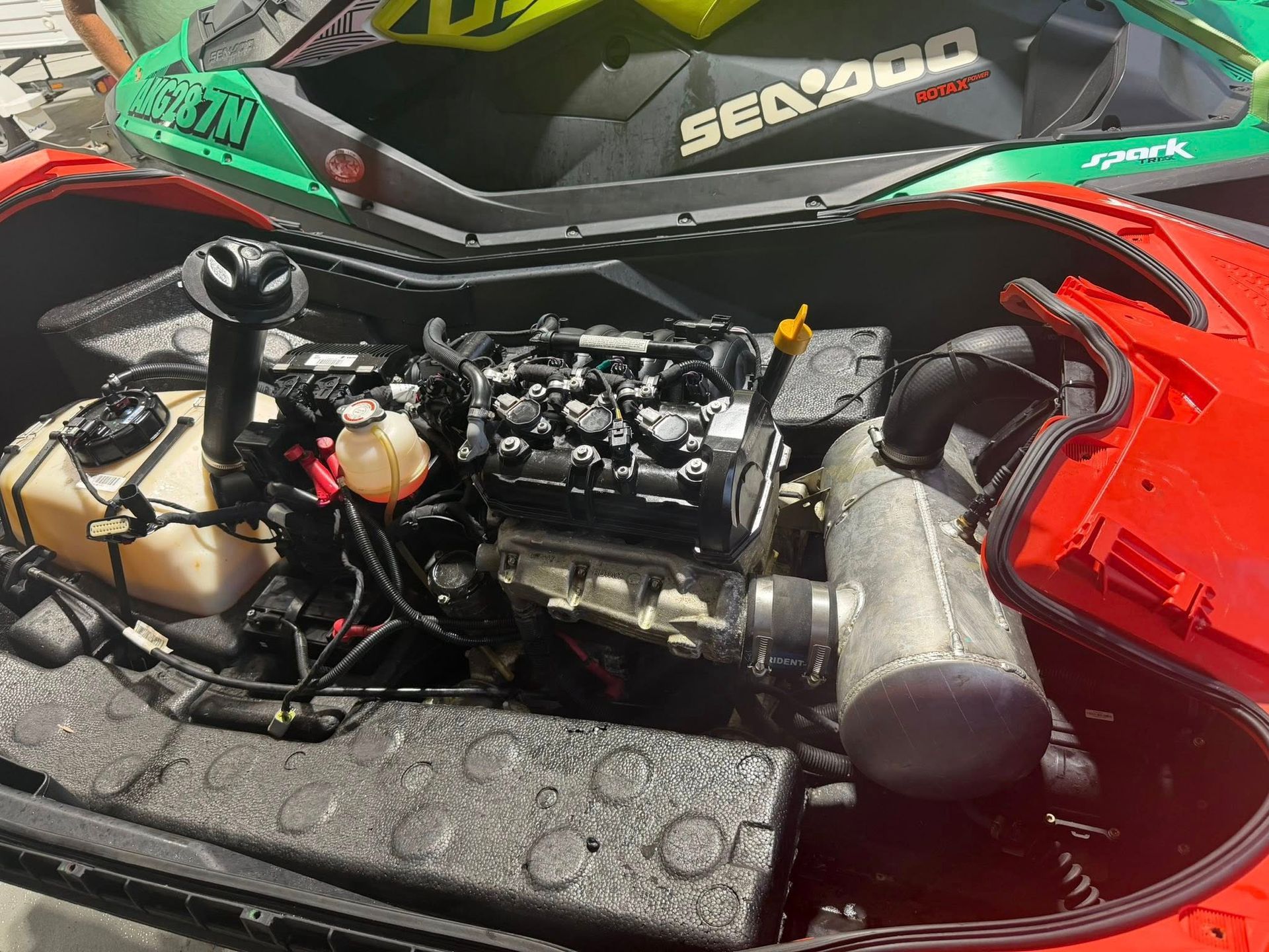 The Open Engine Compartment of a Red Sea-doo Jet Ski — Hastings Mobile Marine Services In Wauchope, NSW