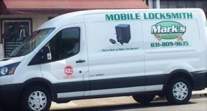 Mark's Mobile Locksmith va driving down the street.