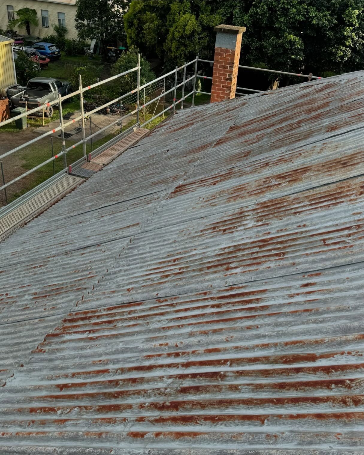 Corrugated metal roof, weathered and rusty — Ace Metal Roofing in Waterview Heights, NSW