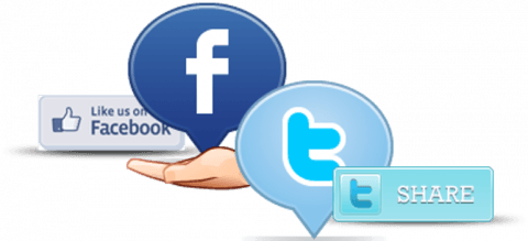Facebook and Twitter social media icons in a hand, with