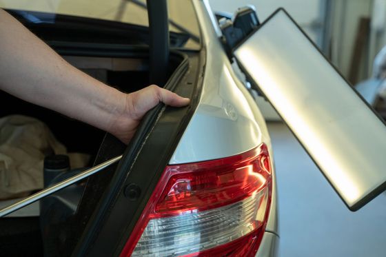 CD Dents Repair performing professional paintless dent repair, hail damage removal, paint chip touch-up, and door edge protection services in Midland, Saginaw, and Sanford, MI—showing technicians, repair tools, and before-and-after results