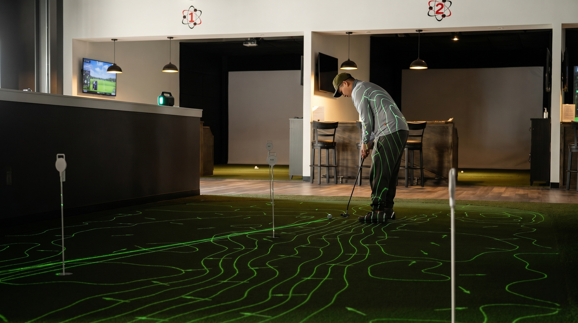 TrackMan indoor golf simulator featuring iconic courses for play