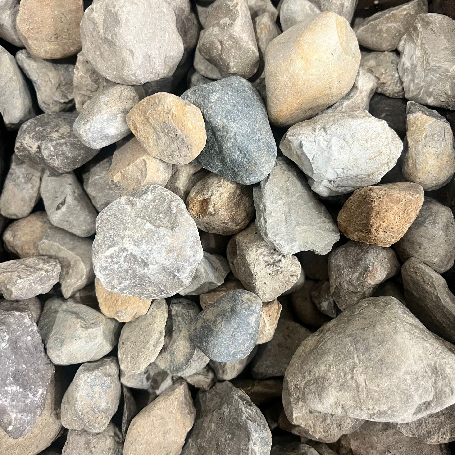 A pile of rocks is sitting on top of each other.