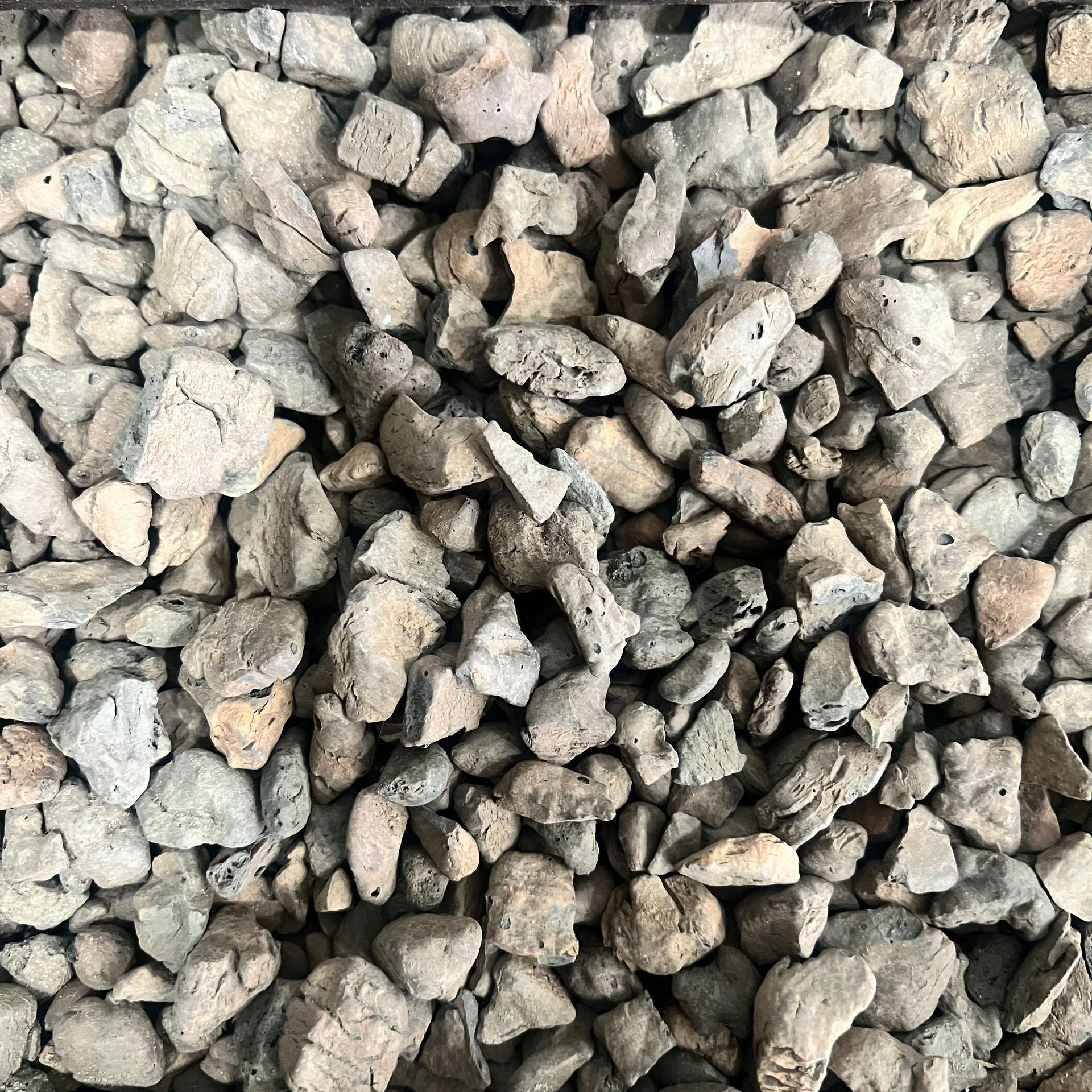 A pile of rocks sitting on top of each other on a table.