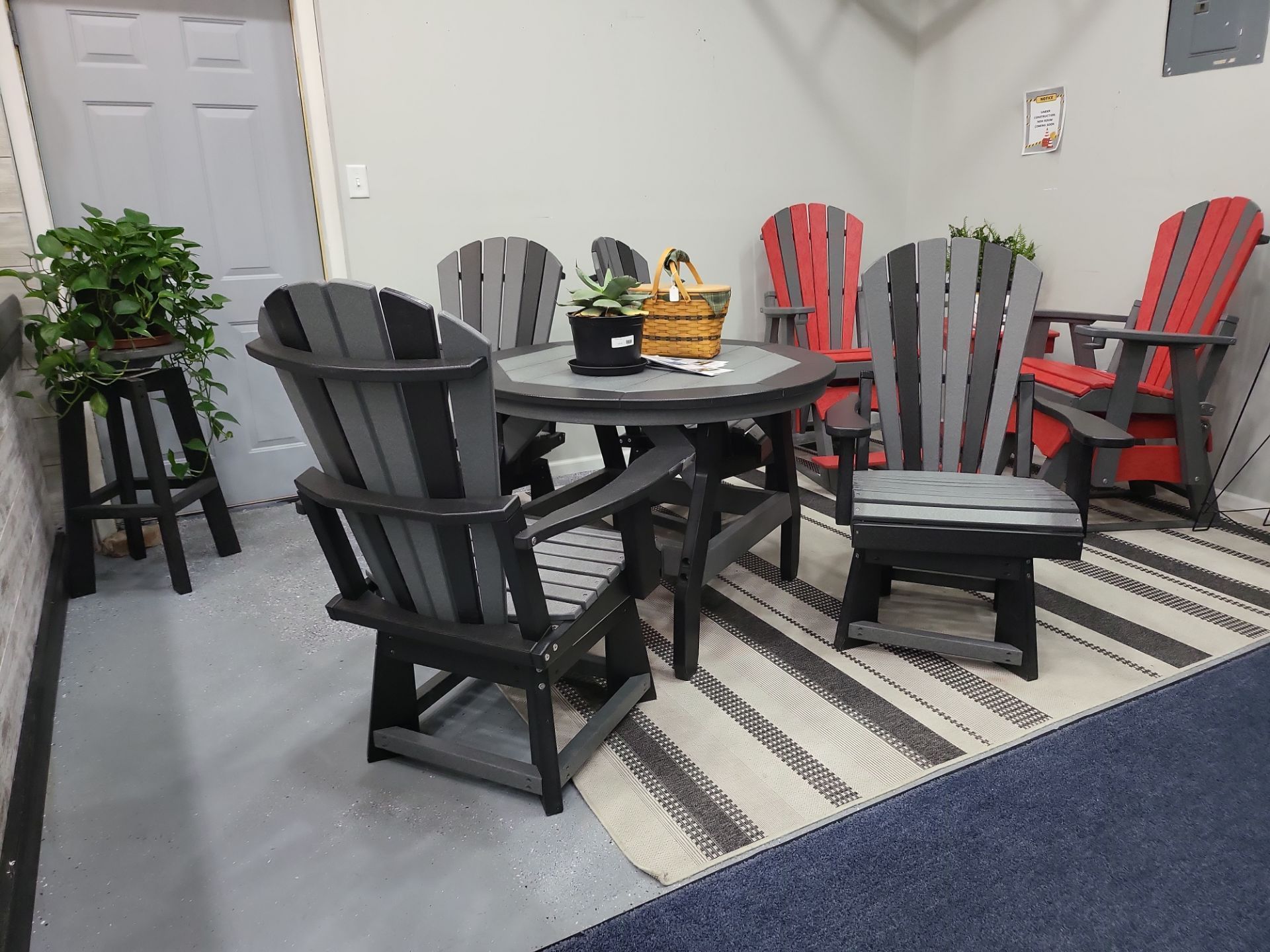 A room with a table and chairs in it