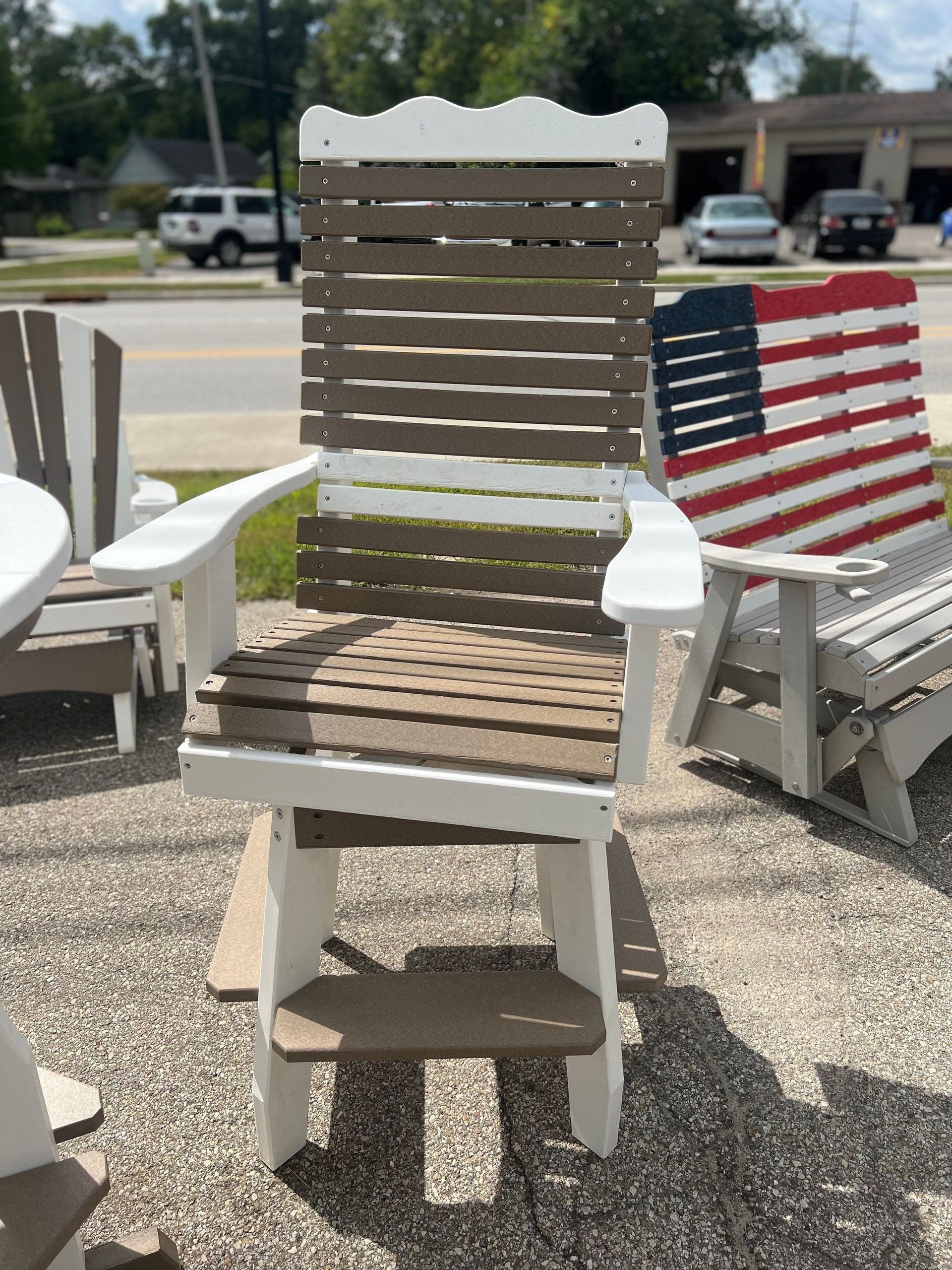 A wooden chair with an american flag on it