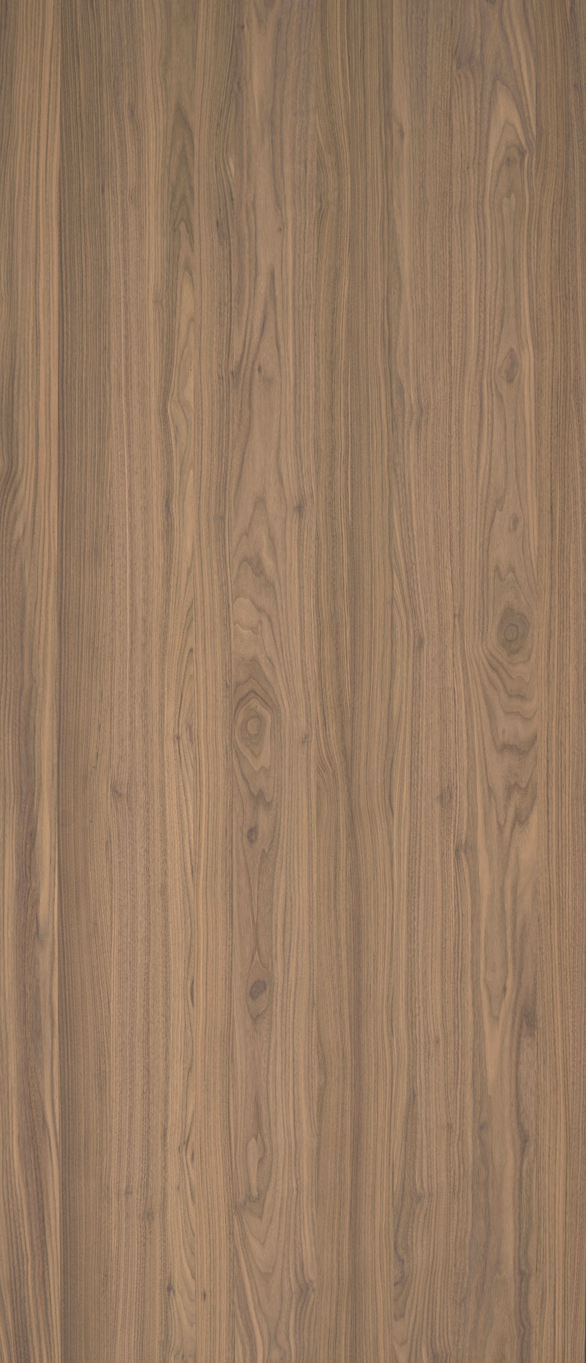 Close-up of brown wooden planks with vertical grain.
