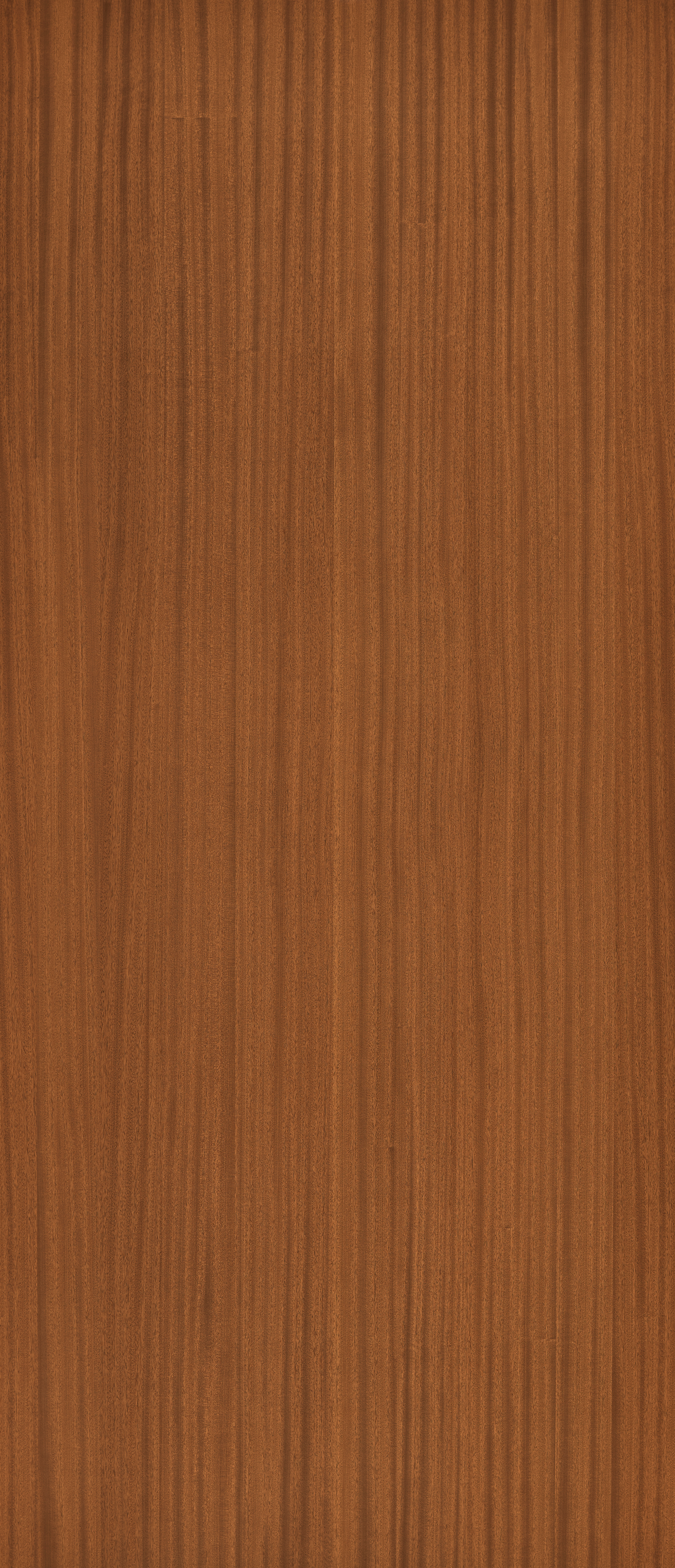 Close-up of brown wood grain with vertical lines and a textured surface.