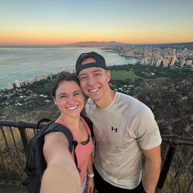 Pastor and his wife selfie at lookout location by lakefront
