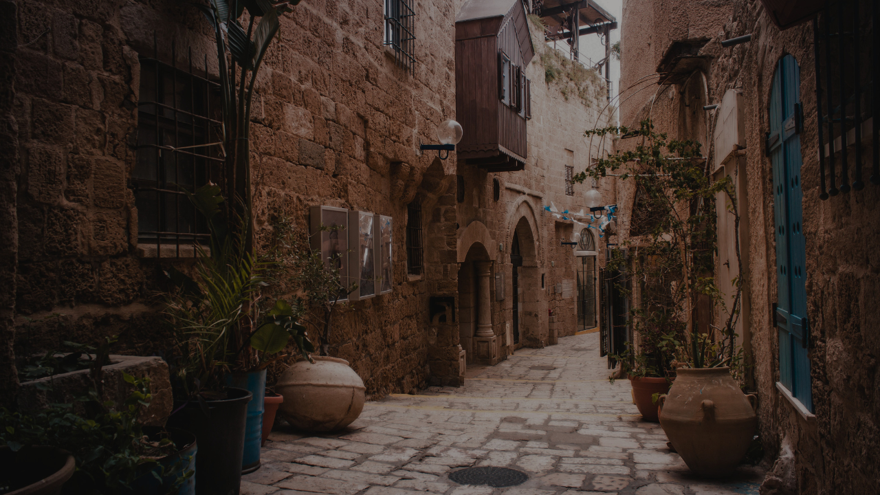 Brick-paved street through Jerusalem’s Old City in the morning light