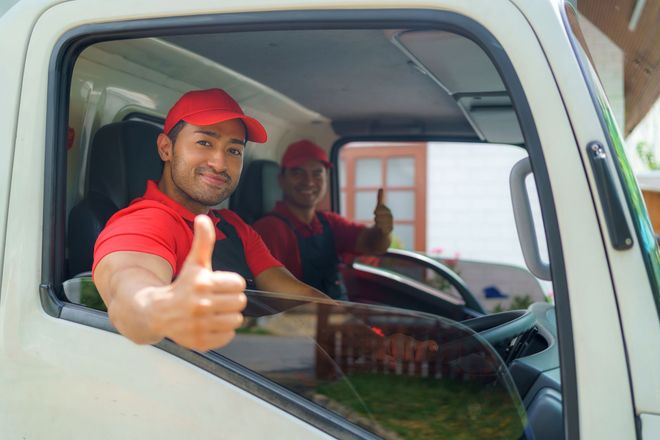 Delivery driver giving thumbs up Delivery driver giving thumbs up