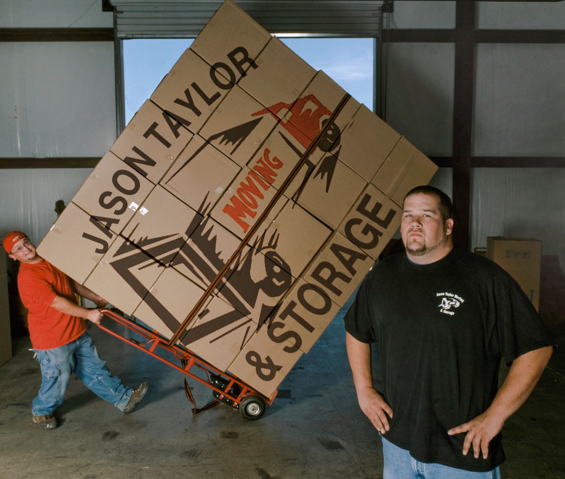 Female Worker Sits On A Chair With Her Laptop — Cumming, Georgia — Jason Taylor Moving & Storage