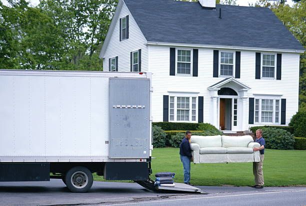 Moving truck outside a house.