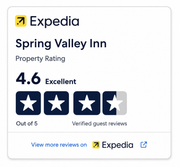 HotelsCombined badge: Spring Valley Inn, 9.2 rating, Recognition of Excellence 2021, blue and dark blue.