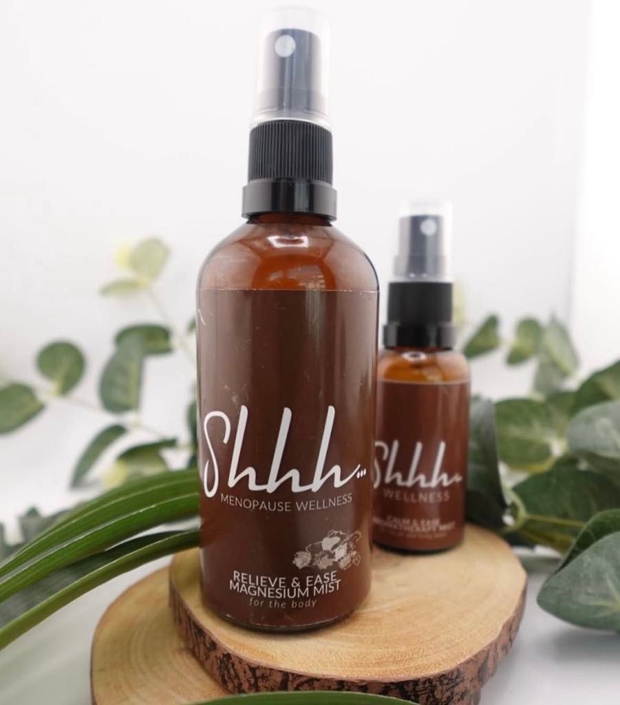 Two brown spray bottles labeled 