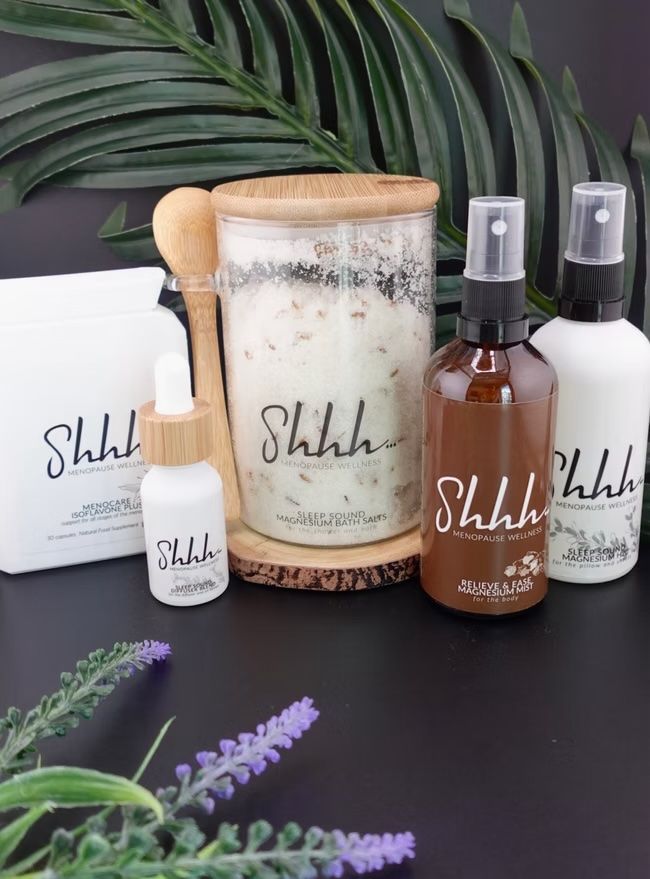 Spa products: scrubs, oil, and sprays labeled 