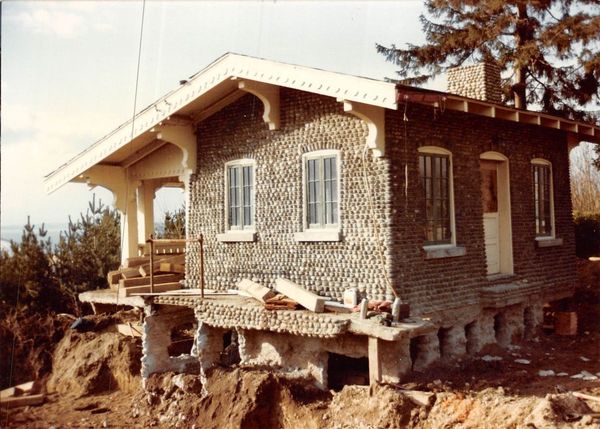A house that is being built out of bottles
