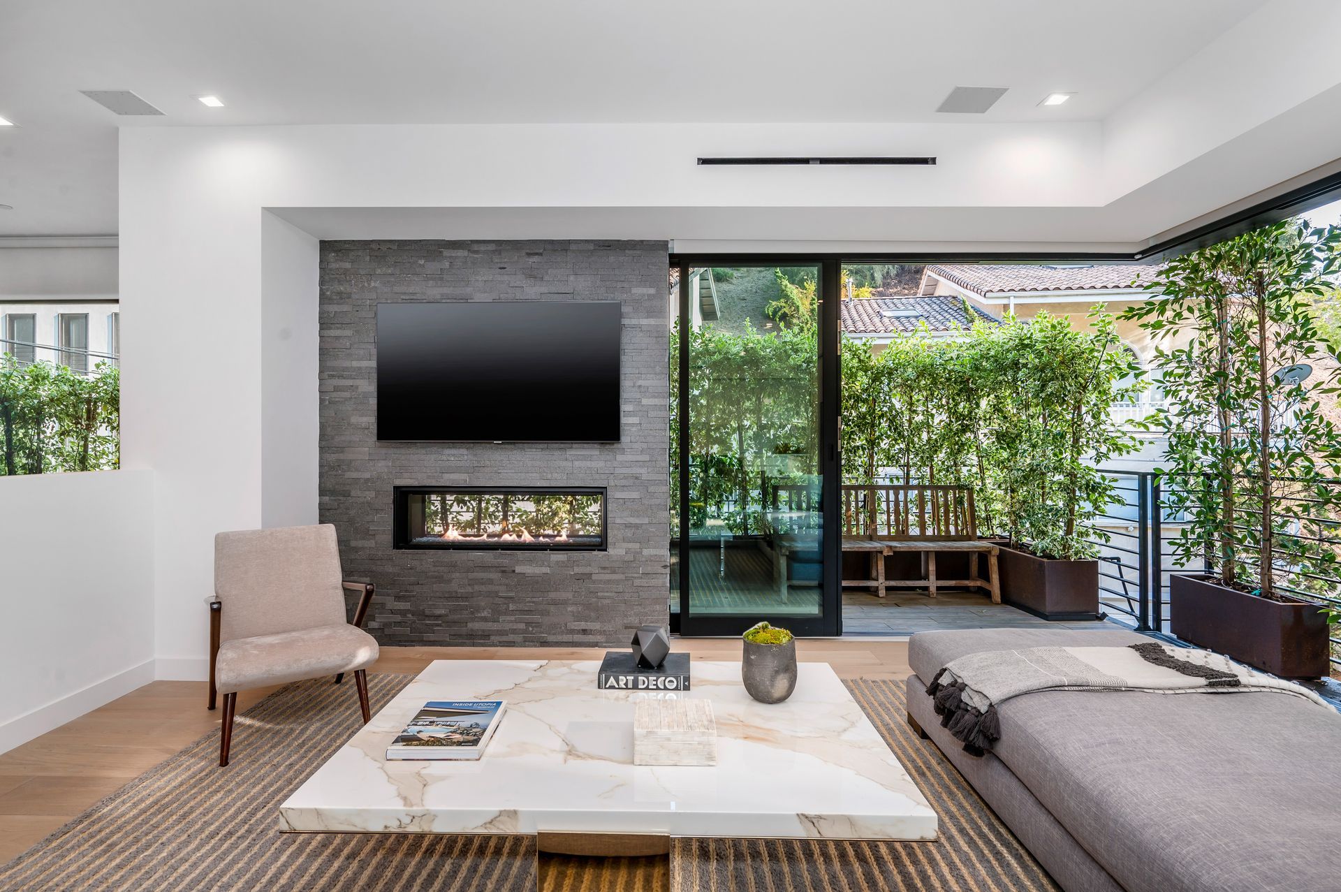 A living room with a fireplace and a flat screen tv Gayle Morris Real Estate | GUIDE Real Estate - Auburn, CA Real Estate