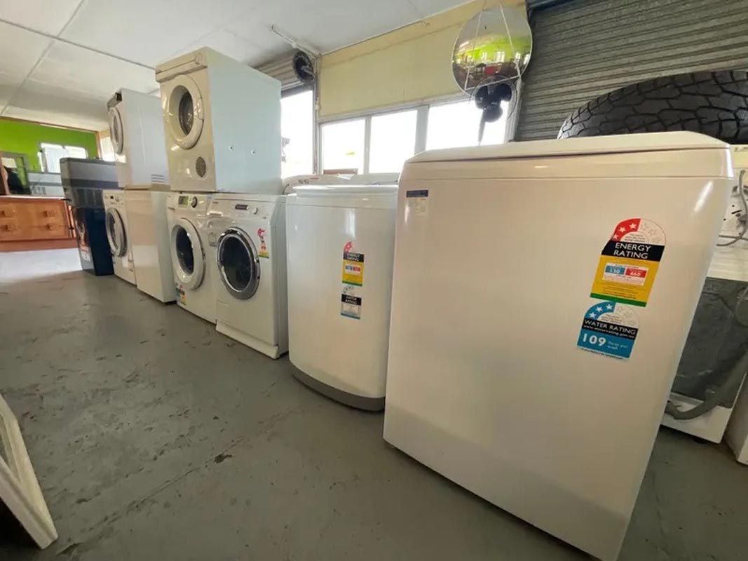 Piled Washing Machines — The Cheapy Shop in Taree, NSW
