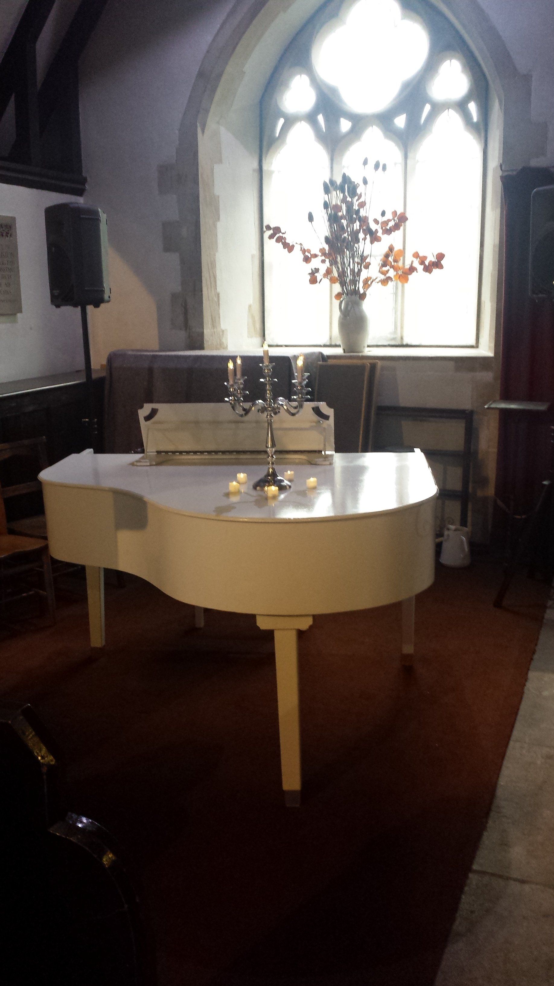 Singing and playing at a funeral service
