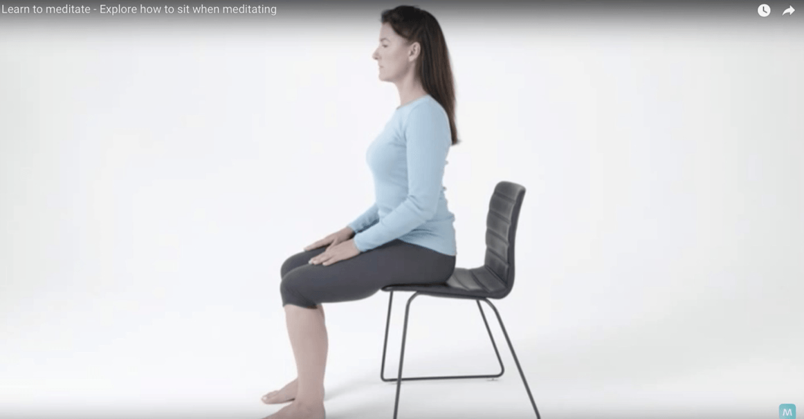 women sitting in chair