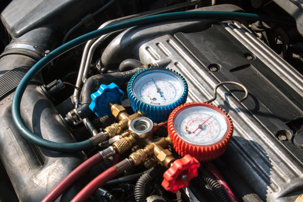 A Car Engine With Two Gauges — Protec Mechanical Repairs In Taree, NSW