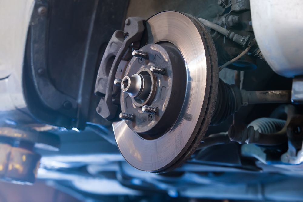 A close up of a brake disc on a car. — Protec Mechanical Repairs In Taree, NSW