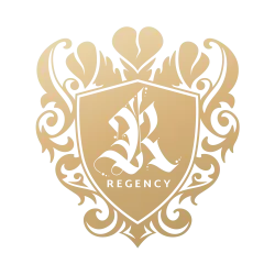 A gold shield with the word regency on it