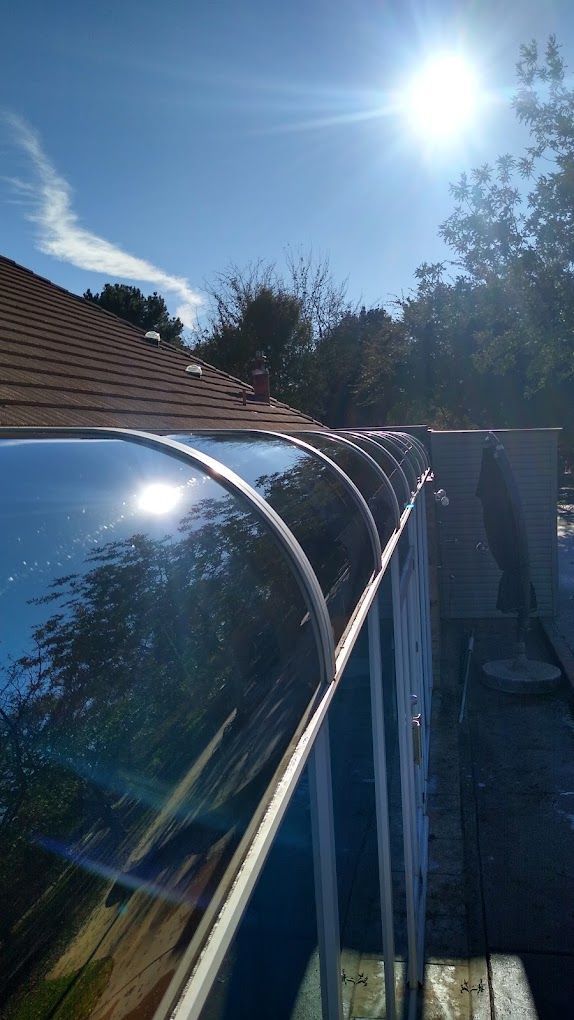 Shiny domed windows freshly cleaned by Closing Cleaners with the sunshine reflecting off the clean glass