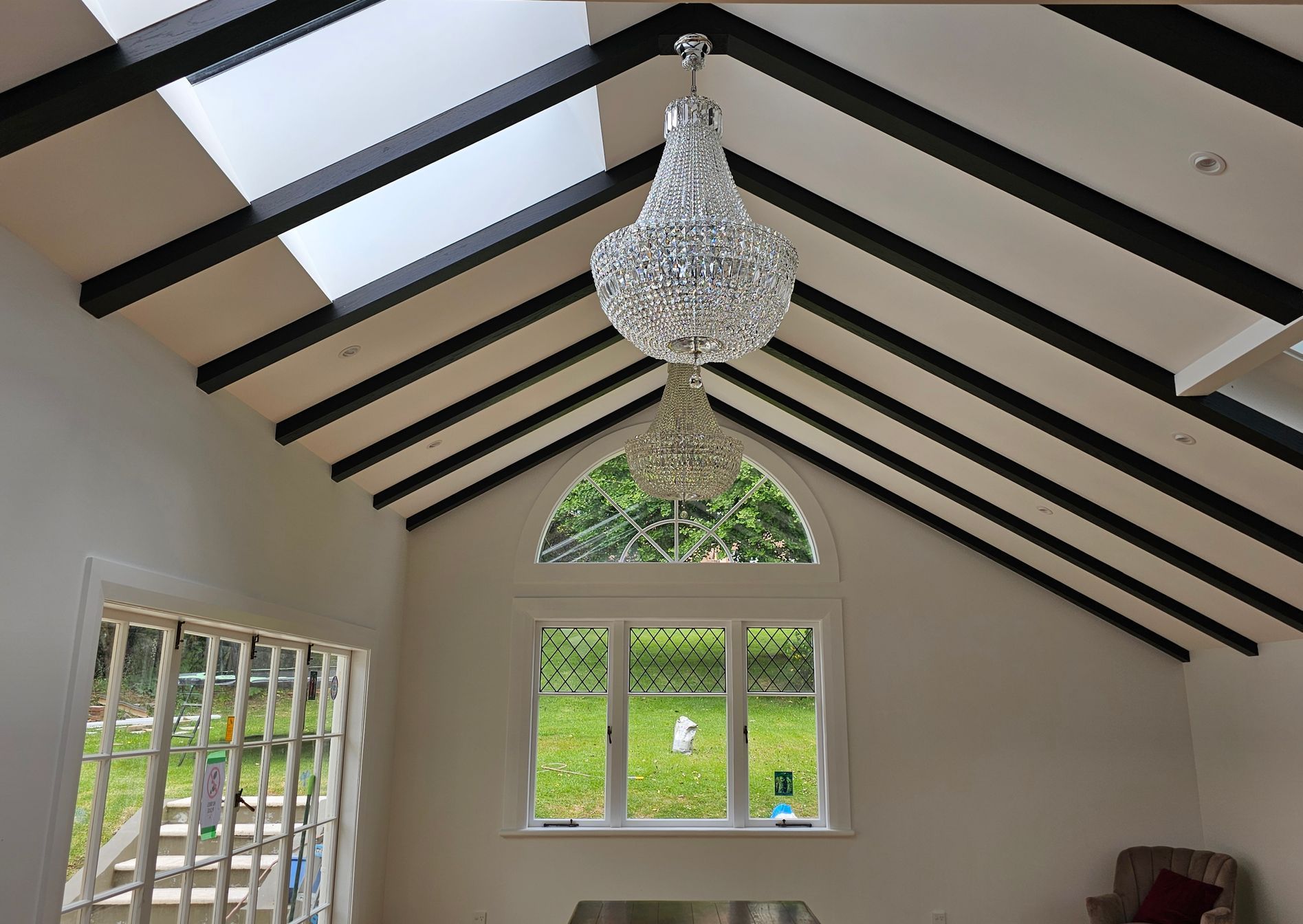 vaulted ceiling with Chandelier