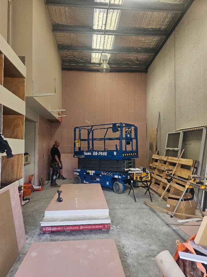 Garage ceiling with corrugated roofing and skylight panels