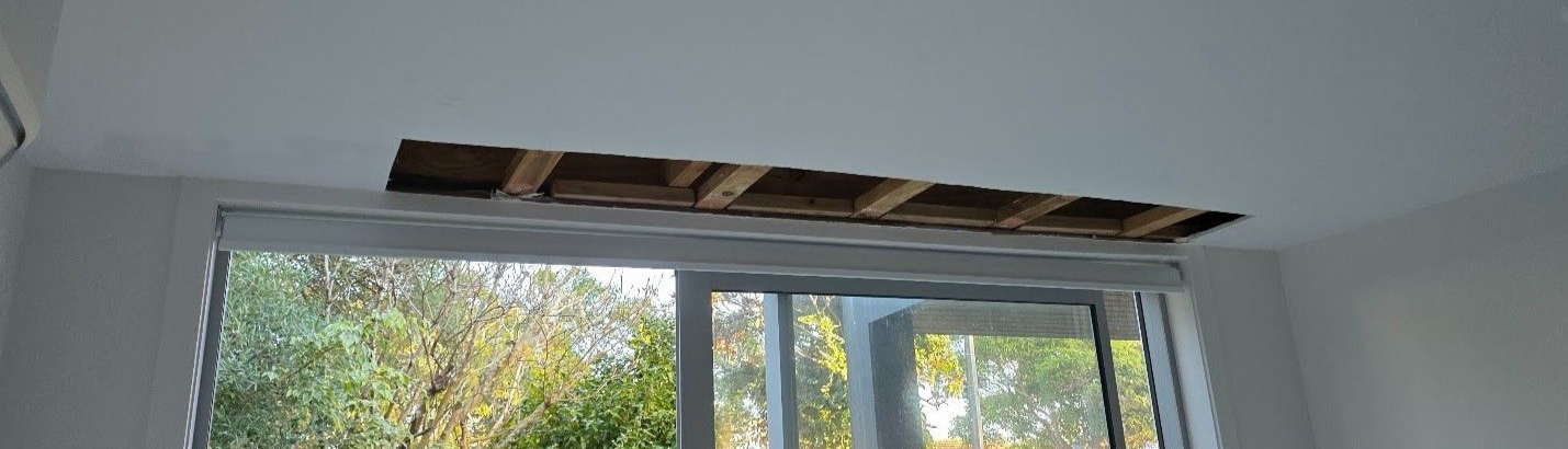 ceiling opened up from water damage