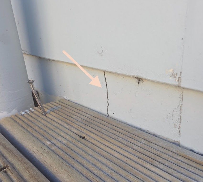 racked sealant at a window and cladding junction allowing water entry